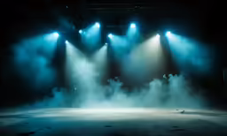 some lights are shining into the room while smoke moves by
