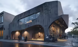 two people walk past an entrance of a building