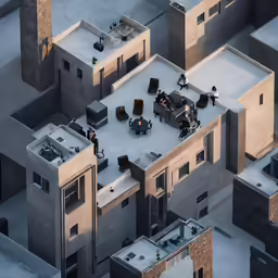 an aerial shot shows people seated on the roof of a building