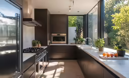 a modern kitchen with wooden cabinets and stainless appliances