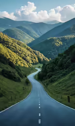 an empty mountain road with a bend in the middle