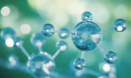 abstract picture with blue bubbles floating from one another