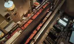 overhead view of a train track that is running through the city