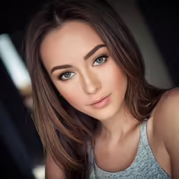 a woman that is posing for a photo