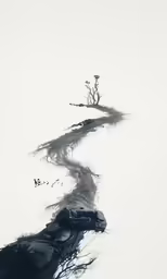a long winding road in the snow on a clear day