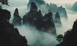 an aerial view of a mountainous area in the morning