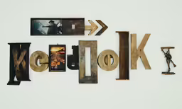 a sign with many pictures attached to it