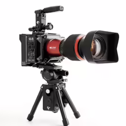 a video camera with the lens attached to it