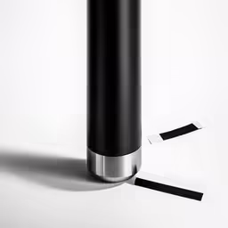 the back side of a cylinder with two small strips near it