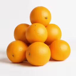 a pile of oranges sitting on top of each other