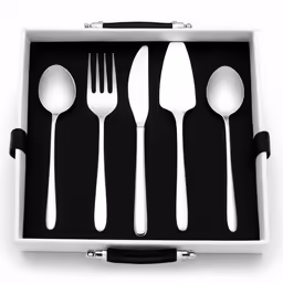 a white boxed box containing spoons, forks and a knife