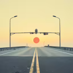 an airport runway with sun set and traffic
