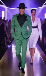 the man is in green suit and hat