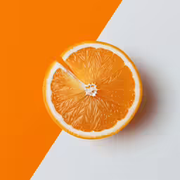 an orange is next to a white background