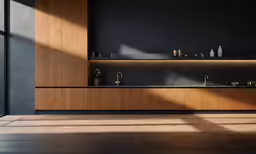 a wooden kitchen with black counters and cabinets