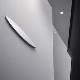 the clock is on the wall next to the door