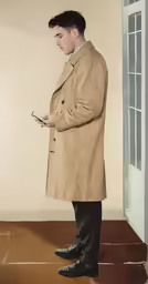 a man wearing a coat and pants is standing in an empty room