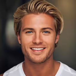 a male with blonde hair and blue eyes