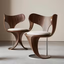 two chairs with white cushions on top