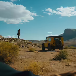 a person that is standing near some dirt