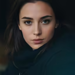 a woman is looking forward in this image