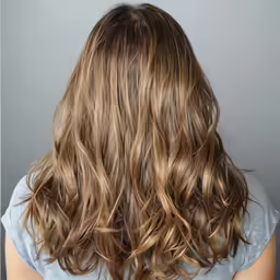 long, straight and wavy blonde hair with light highlights