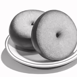 two donuts sitting on a plate ready to be eaten