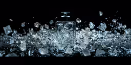 two square containers with water and ice cubes surrounding it
