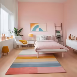 pink room with white walls, hardwood floors and a rainbow rug