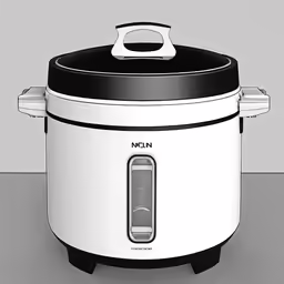 a white and black crock pot on top of a counter