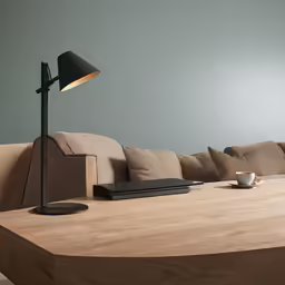 a large table that has a lamp on top of it