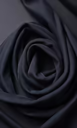 black and grey colored fabric that looks like silk