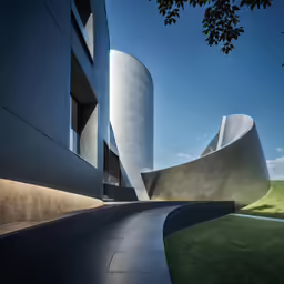 the outside facade of the building has curving walkway