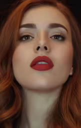 woman with red hair and light makeup wearing long earrings
