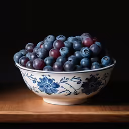 a bowl of grapes and grapes are in it