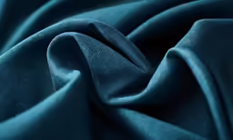the blue color of fabric textured up close