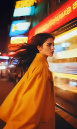 a woman with long hair walking on a street
