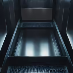 the metal shelf is black and the light in the hallway is blue