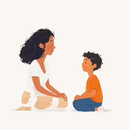 a woman with her son sitting down while they are sitting