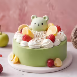 there is a birthday cake with fruits and an adorable bear on top
