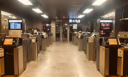 an airport security room with all electronic devices