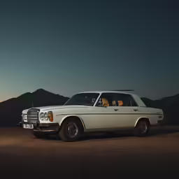a white station wagon with a passenger in the back seat