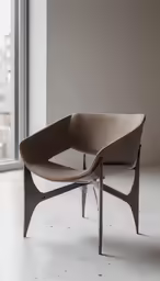 the chair is sitting by a window in a white room