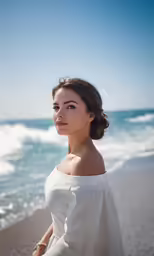 a woman standing in front of a blue ocean