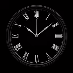 black and white photo of a clock with roman numerals