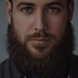 a man with a beard and bow tie