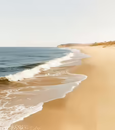 a beach with waves in the foreground and one person walking on it