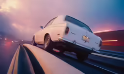 the rear of an automobile driving down a highway