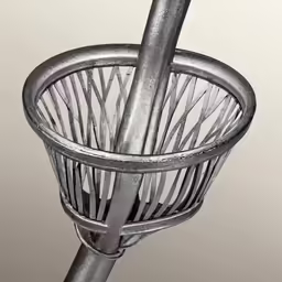 a black and white photo of a metal basket