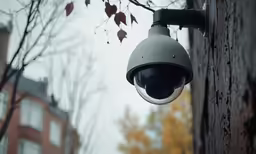 a view of a security camera on a post